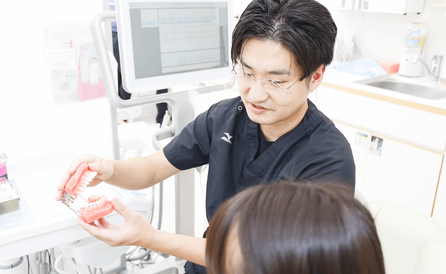 歯科医師による診断結果・治療計画を聞く
